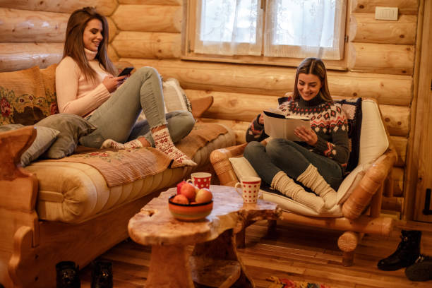 istock Cheerful young girlfriends spending time together and relaxing 1253390486