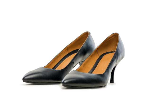 istock Black High Heel Shoes Isolated on White 1253390761