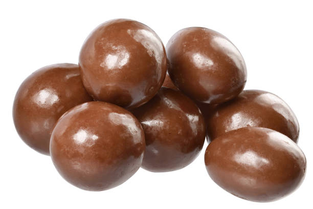 istock Chocolate balls close up isolated 1253391815