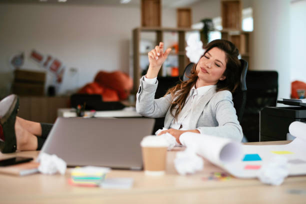 istock Beautiful businesswoman working on project. 1253393065