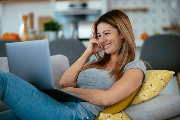 istock Young woman having video call on lap top. 1253393983