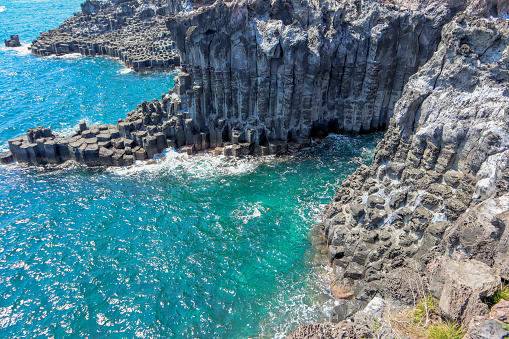 Cliff is a spectacular volcanic rock formation at the southern coast of Jeju Island, South Korea.