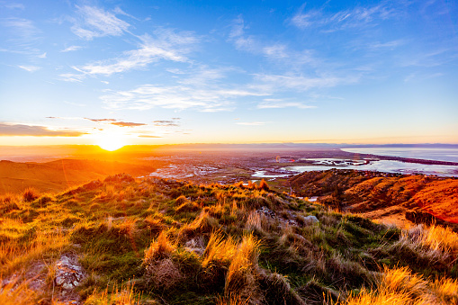 An autumn sunset over the largest city in New Zealand's South Island. Photographed from Mt. Pleasant in the Port Hills.