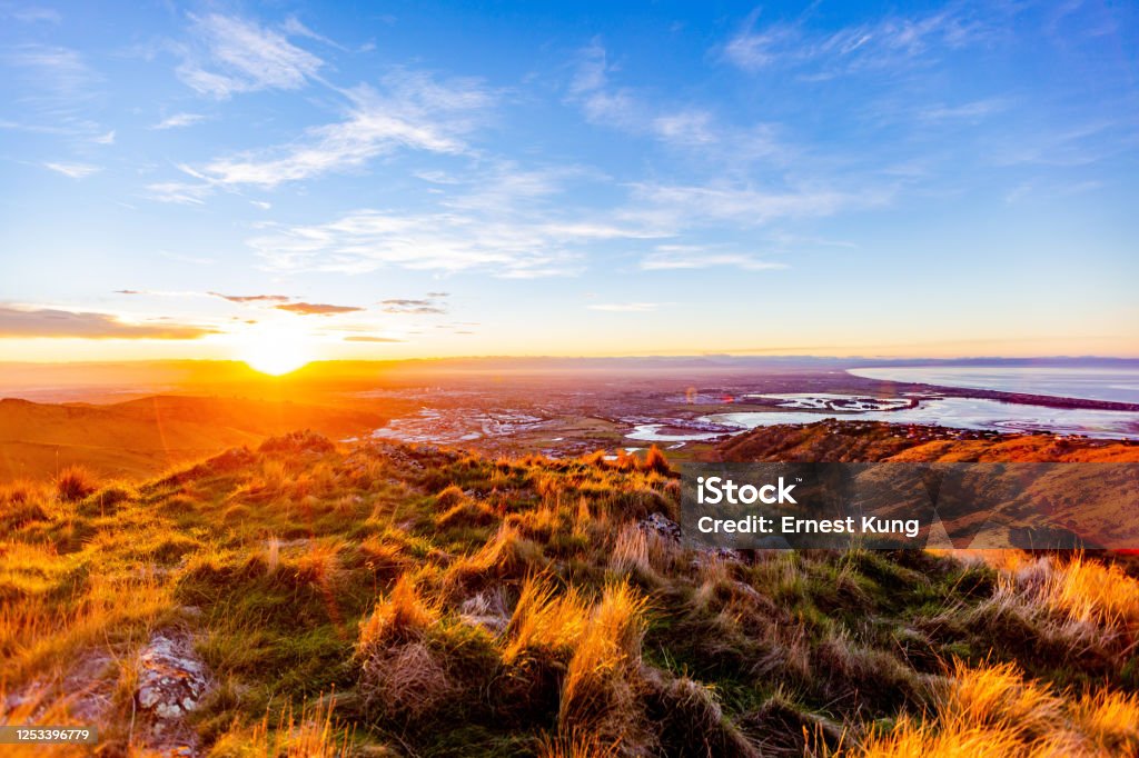 Sunset Over Christchurch An autumn sunset over the largest city in New Zealand's South Island. Photographed from Mt. Pleasant in the Port Hills. Christchurch - New Zealand Stock Photo