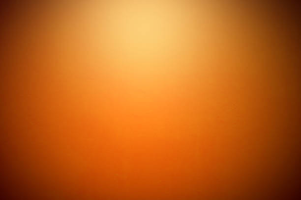 istock Orange bright painted concrete texture  Abstract Grunge Decorative Stucco wall background for the designer, Gold background yellow color light corner spotlight faint orange vintage background, Colorfu 1253401501