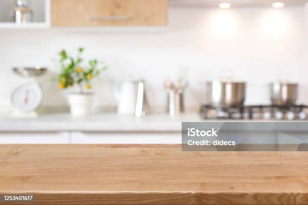 Wood Tabletop On Blur Kitchen Counter Background For Product Display Stock Photo - Download Image Now