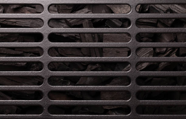 istock Metal barbecue grill over hot coal 1253402836