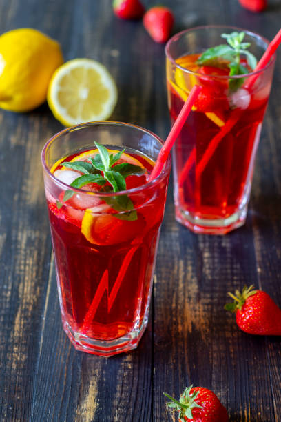 istock Strawberry lemonade with mint and lemon. Cold drinks. Summer. Recipe. 1253405395