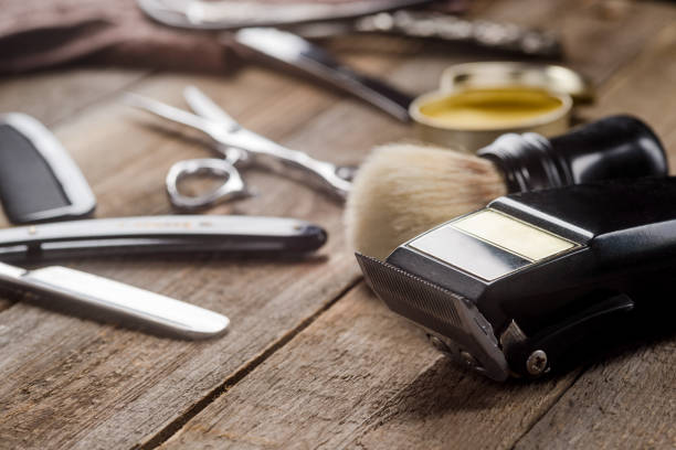 istock Electric clipper on the wooden surface, macro 1253406693