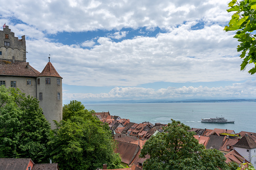 Meersburg, BW / Germany - 22 June 2020: view of Meersburg on Lake Constance with the historic old castle and a passenger boat