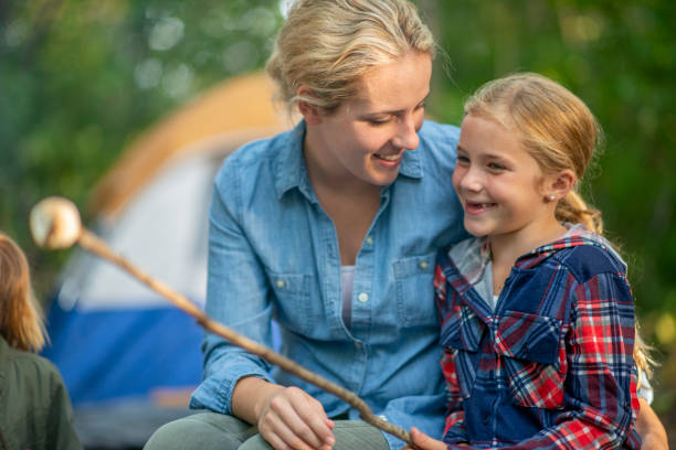 istock Family enjoying a summer camping trip 1253410165
