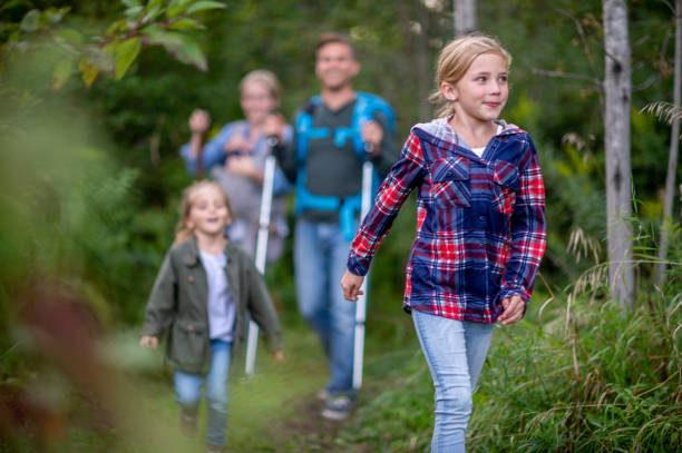 istock Family enjoying a summer camping trip 1253410192