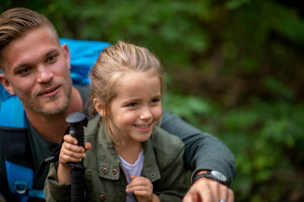 istock Family enjoying a summer camping trip 1253410206