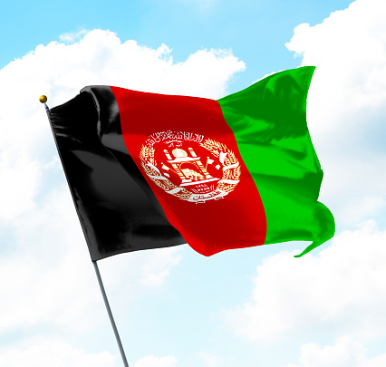 Flag of Afghanistan Raised Up in The Sky