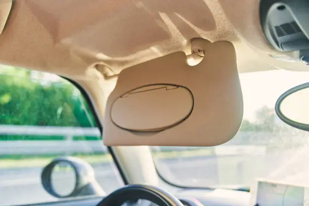 Photo of Grey open sun visor in car interior