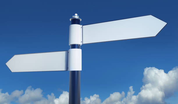 istock Blank Signpost over blue sky 1253413931