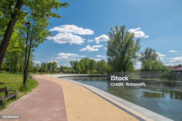 Pisa River And Walking And Cycling Path In Pisz Stock Photo - Download Image Now - Architecture, Beauty, Blue