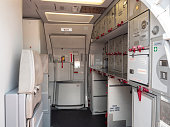 Aircraft aft galley with full of storage unit. The most right unit show how it look like.