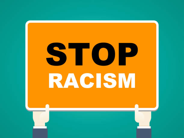 istock Stop racism concept-stop racism sign in businessman's hands 1253421242