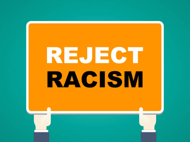 istock Stop racism concept-stop racism sign in businessman's hands 1253421372