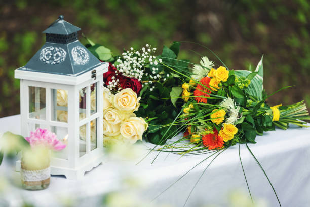 istock wedding decorations and flowers on the table outdoors 1253421972