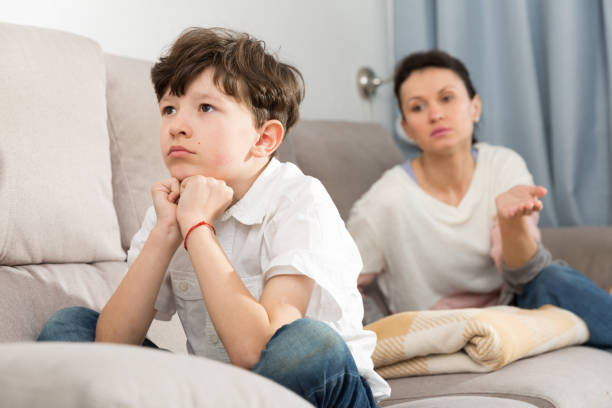 istock Frowning tweenager listening mother 1253424802