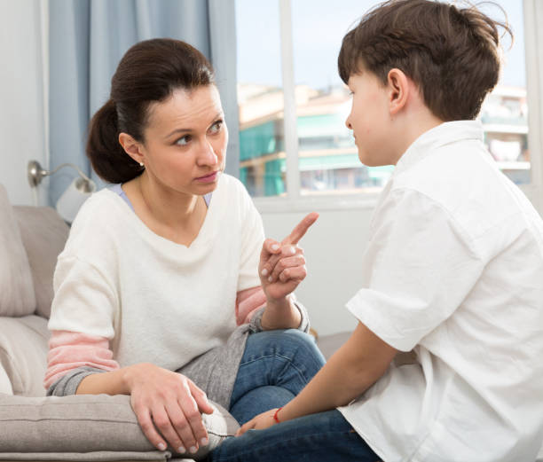 istock Woman scolding son 1253424807