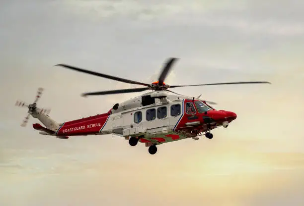 British coastguard helicopter, off the coast of Eastbourne, East Sussex