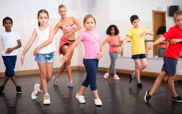 istock Boys and girls training in dance studio 1253426204