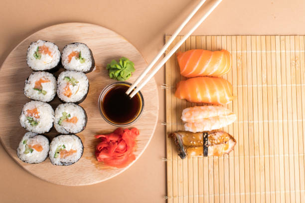 istock Composition with delicious nigiri sushi and rolls 1253429480