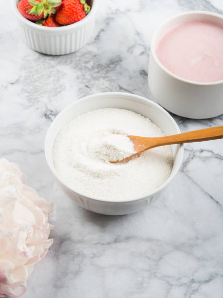 istock Collagen protein powder in bowl on marble 1253429994