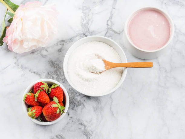 istock Collagen protein powder in bowl on marble 1253429997