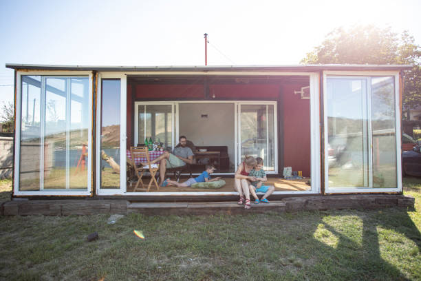 istock Family on vacation in their container house 1253438215