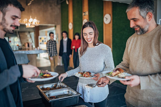 istock Group of people on lunch break together 1253440847