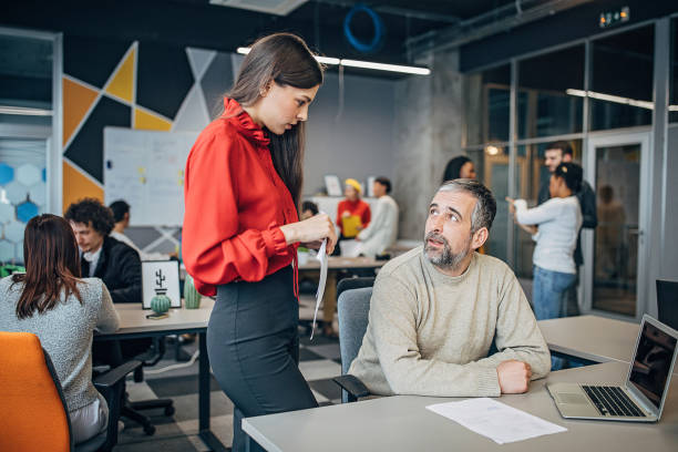 istock Business people working together in big modern office 1253441340
