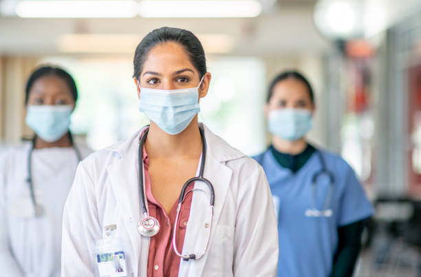 istock Healthcare professionals in mask 1253442141
