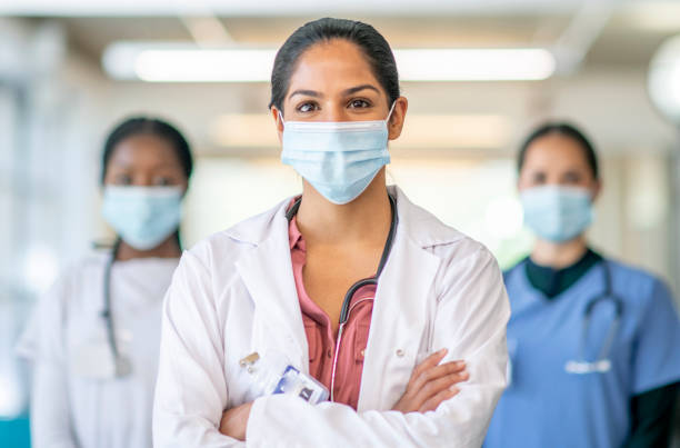 istock Healthcare professionals in mask 1253442145