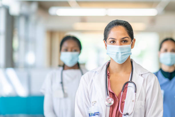 istock Healthcare professionals in mask 1253442149