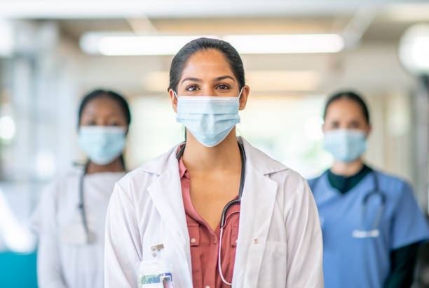 istock Healthcare professionals in mask 1253442154