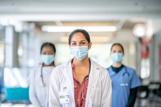 istock Healthcare professionals in mask 1253442157