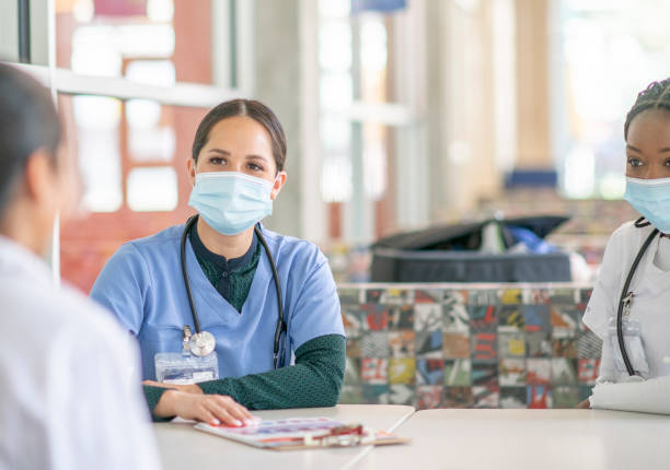 istock Healthcare professionals in mask 1253442229