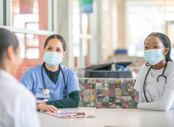 istock Healthcare professionals in mask 1253442238
