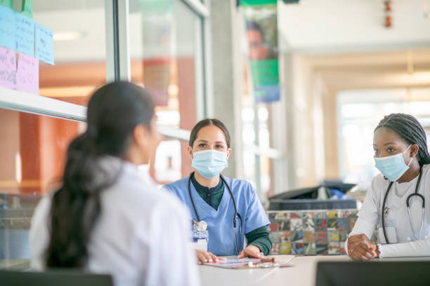 istock Healthcare professionals in mask 1253442249