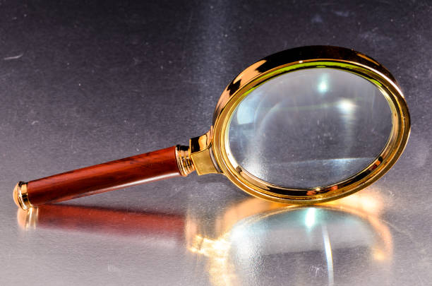 istock Vintage Magnify Glass Loupe 1253444442
