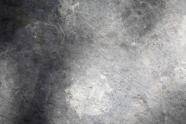 istock 4K. Concrete real dirty wall. Seamless texture. Grunge grey background pattern. Cement and sand cracked wall of tone vintage for backdrop or decoration. Graffiti wall. 1253447986
