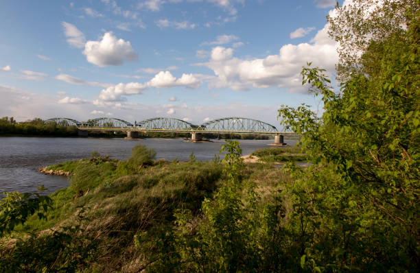 istock Fordon Bridge Rudolf Modrzejewski - a rail-road bridge, with a lattice structure, on the Vistula River in Bydgoszcz, in the Fordon district in Poland. 1253448983