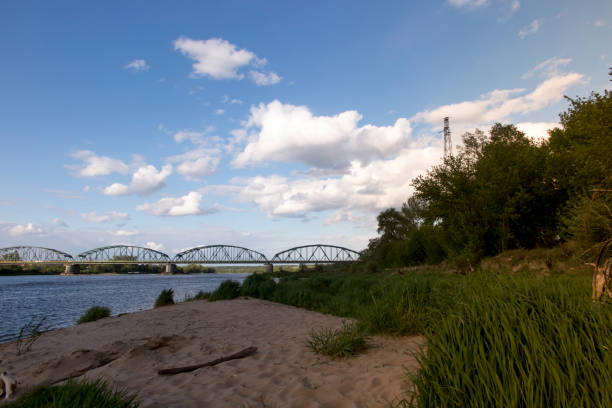 istock Fordon Bridge Rudolf Modrzejewski - a rail-road bridge, with a lattice structure, on the Vistula River in Bydgoszcz, in the Fordon district in Poland. 1253449024