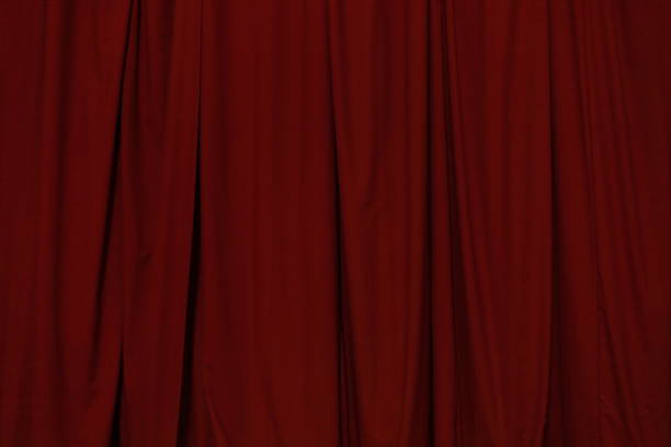 istock Theater lights spotlights and smoke over the stage 1253449514