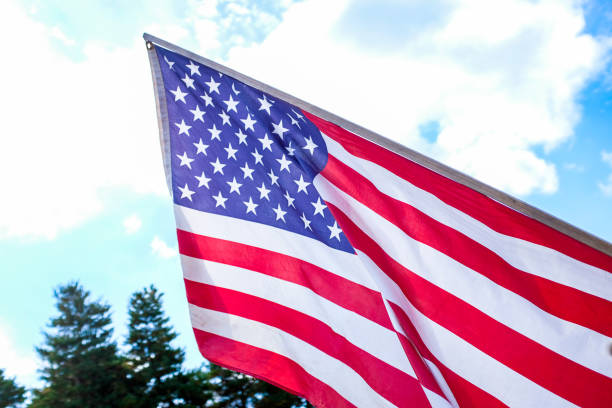 istock American flag waving in the wind 1253449515