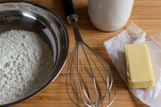 istock Making white savoury sauce at home 1253450326